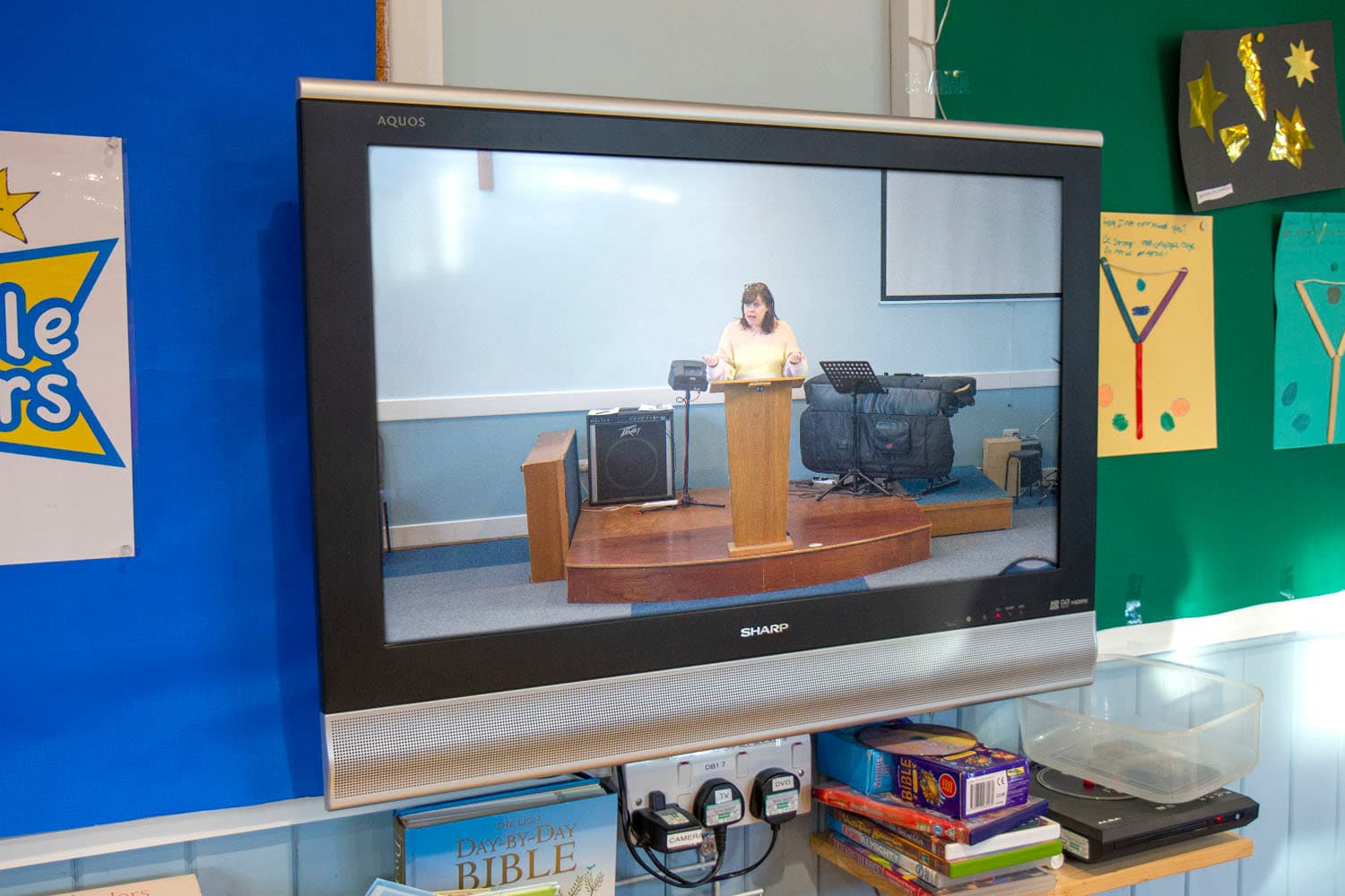 The service livestreamed on a TV in the crèche room